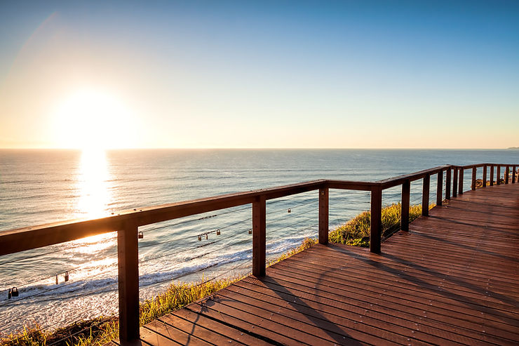 Boardwalk overlooking the water and miami sunset