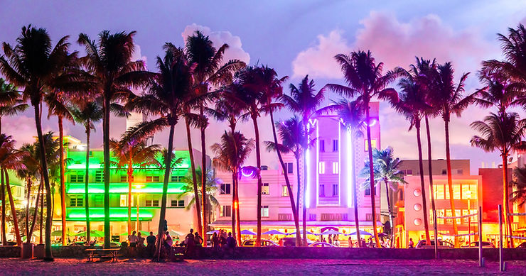 South Beach at night lit up with neon lights